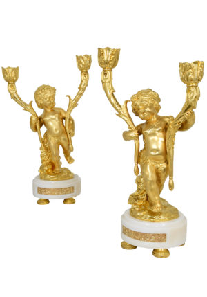 Paire de chandeliers aux chérubins d'époque Napoléon III