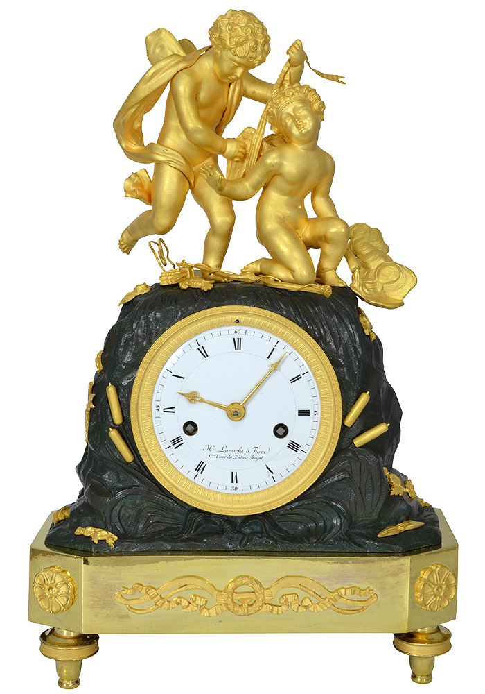 Pendule aux angelots "Henry Laresche à Paris 1er Cour Palais Royal"