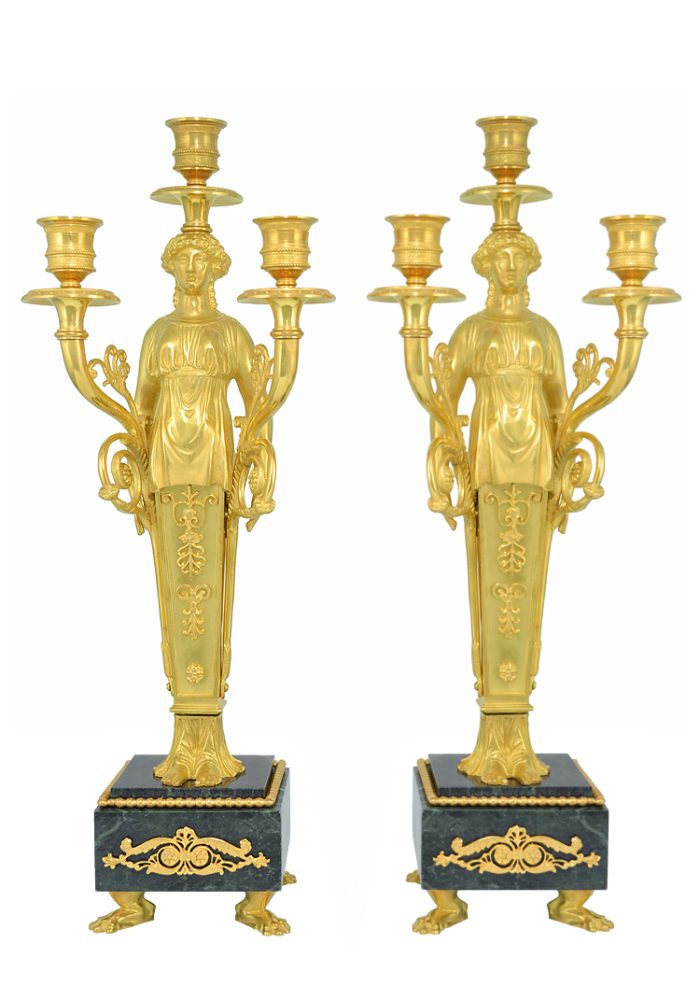 Paire de chandeliers en bronze doré style Empire. XIXème