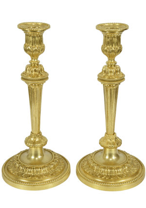 Paire de bougeoirs en bronze doré XIXème