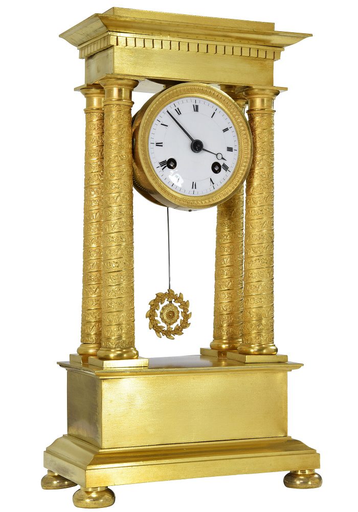 Petite pendule portique colonnes spirale époque Empire