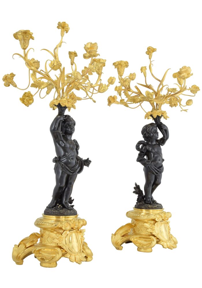 Paire de candélabres fleuri aux chérubins XIXème