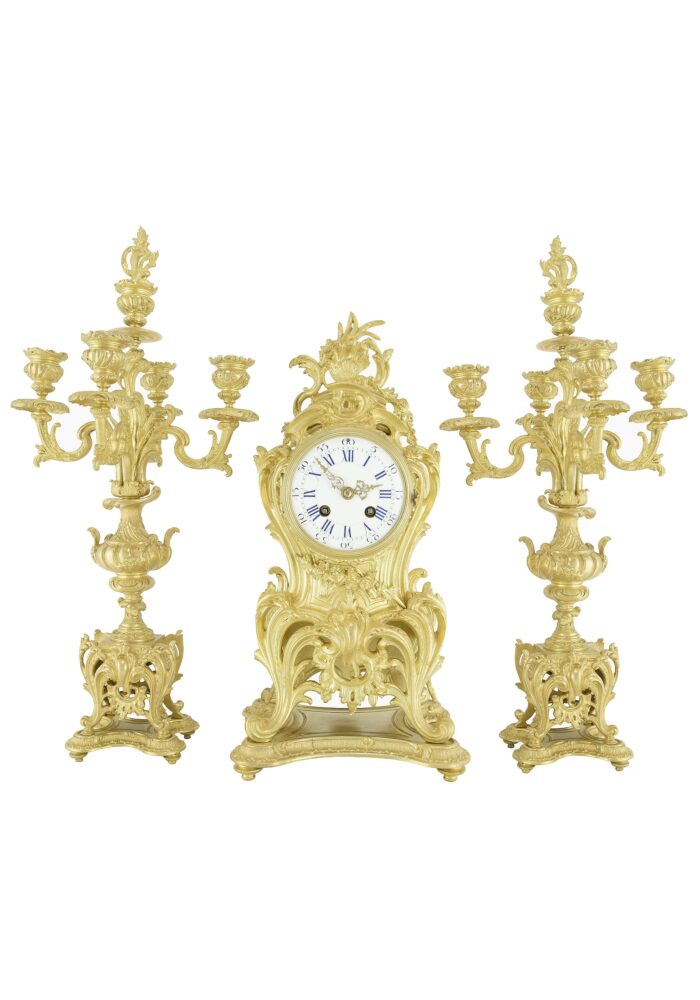 Pendule et chandeliers en bronze Horloger: Mougin