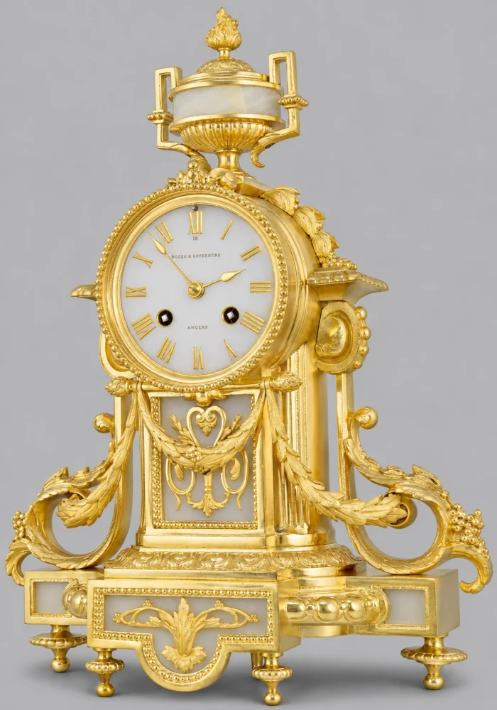 Pendule bronze doré et onyx Horloger :  BOZZO 1860