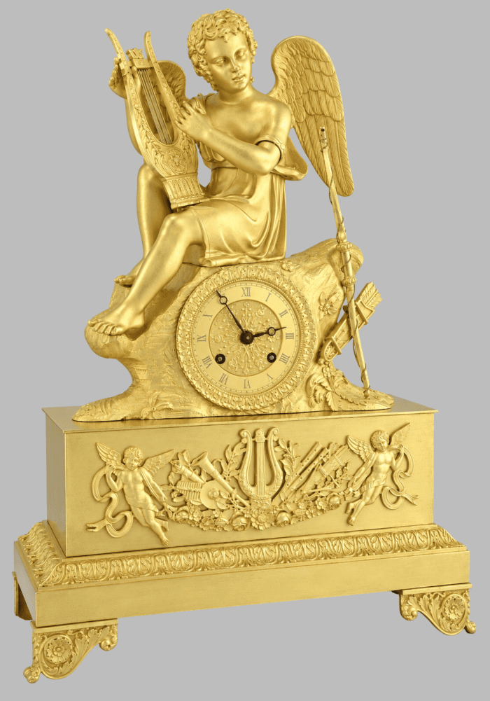 Pendule allégorique au putto musicien figurant l’Amour